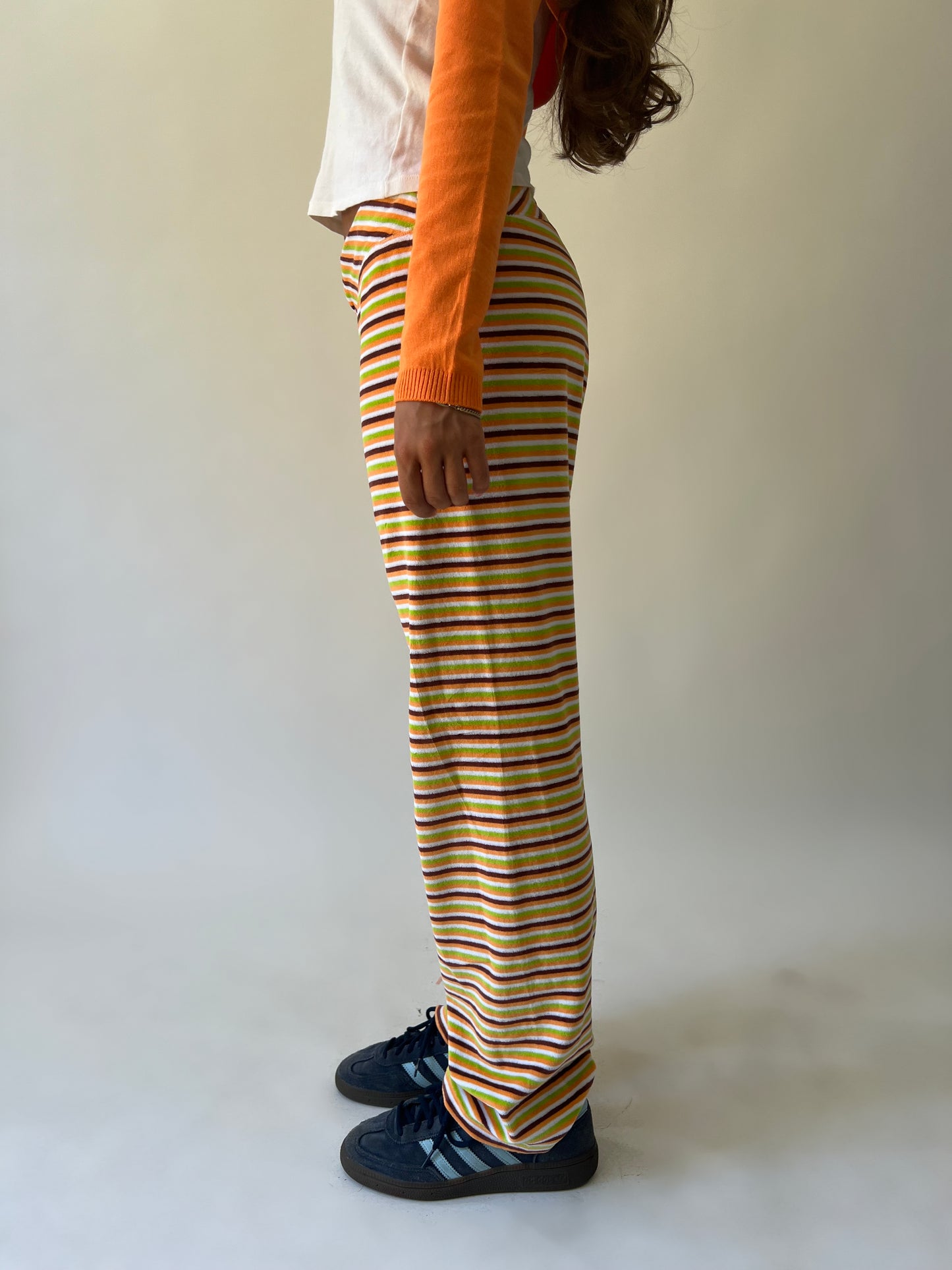 large multicoloured striped flared trousers side view