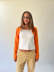 large multicoloured striped flared trousers front detail view