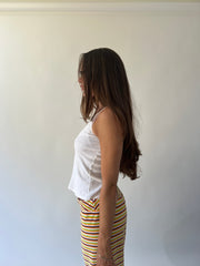 large multicoloured striped flared trousers close side view