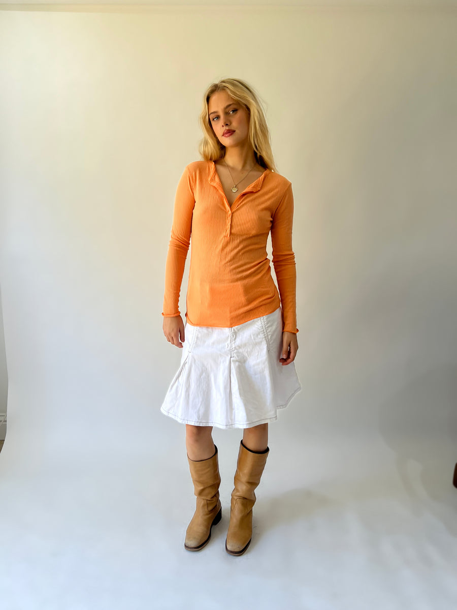 large orange ribbed button long sleeve top front view