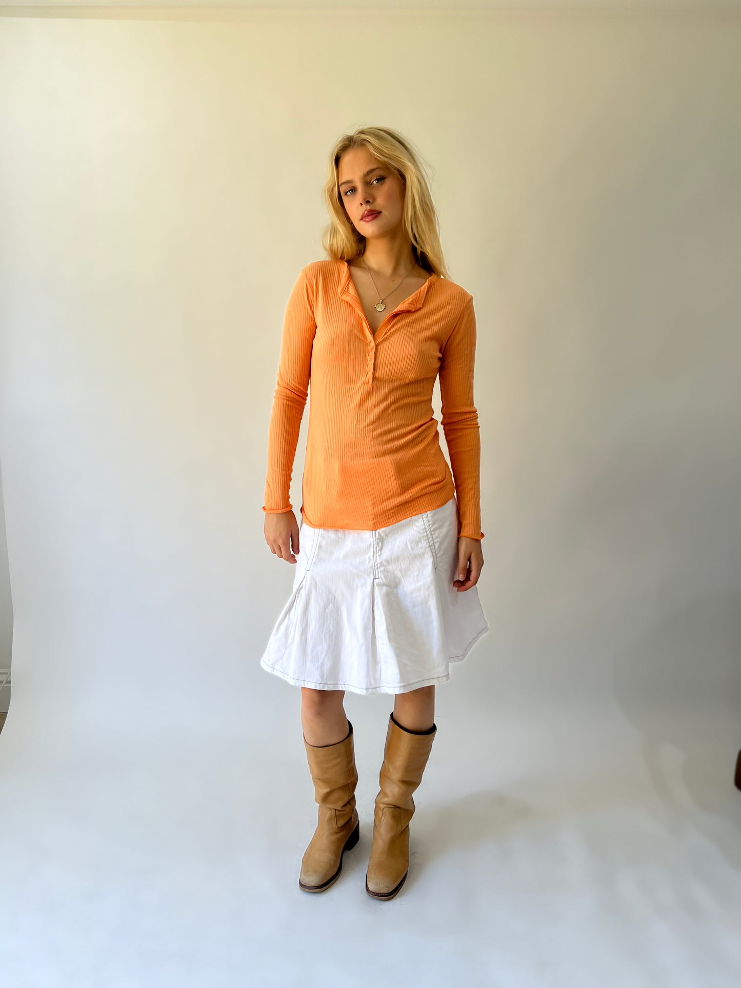 large orange ribbed button long sleeve top front view