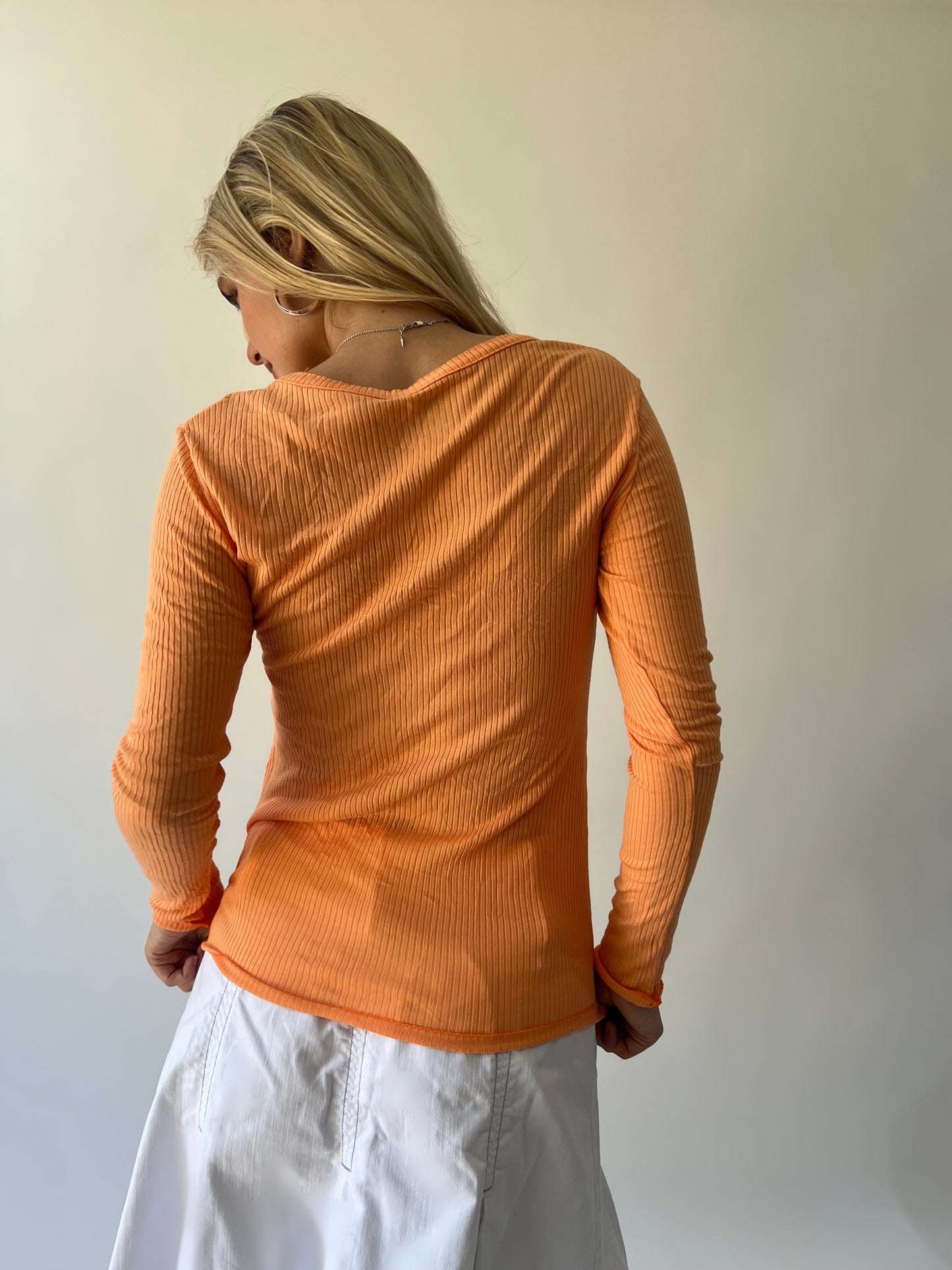 large orange ribbed button long sleeve top back view