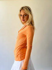 large orange ribbed button long sleeve top side view