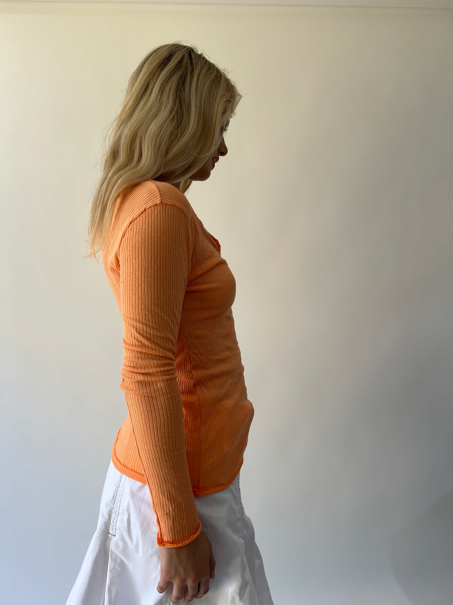 large orange ribbed button long sleeve top second side view