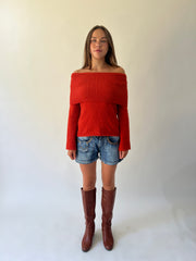 large orange off-shoulder ribbed sweater front view