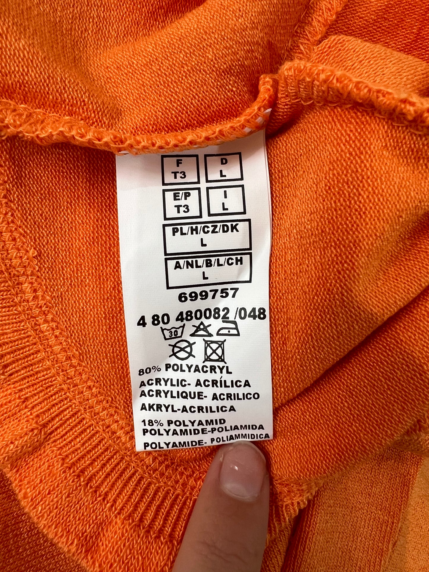 orange ribbed sweater large label