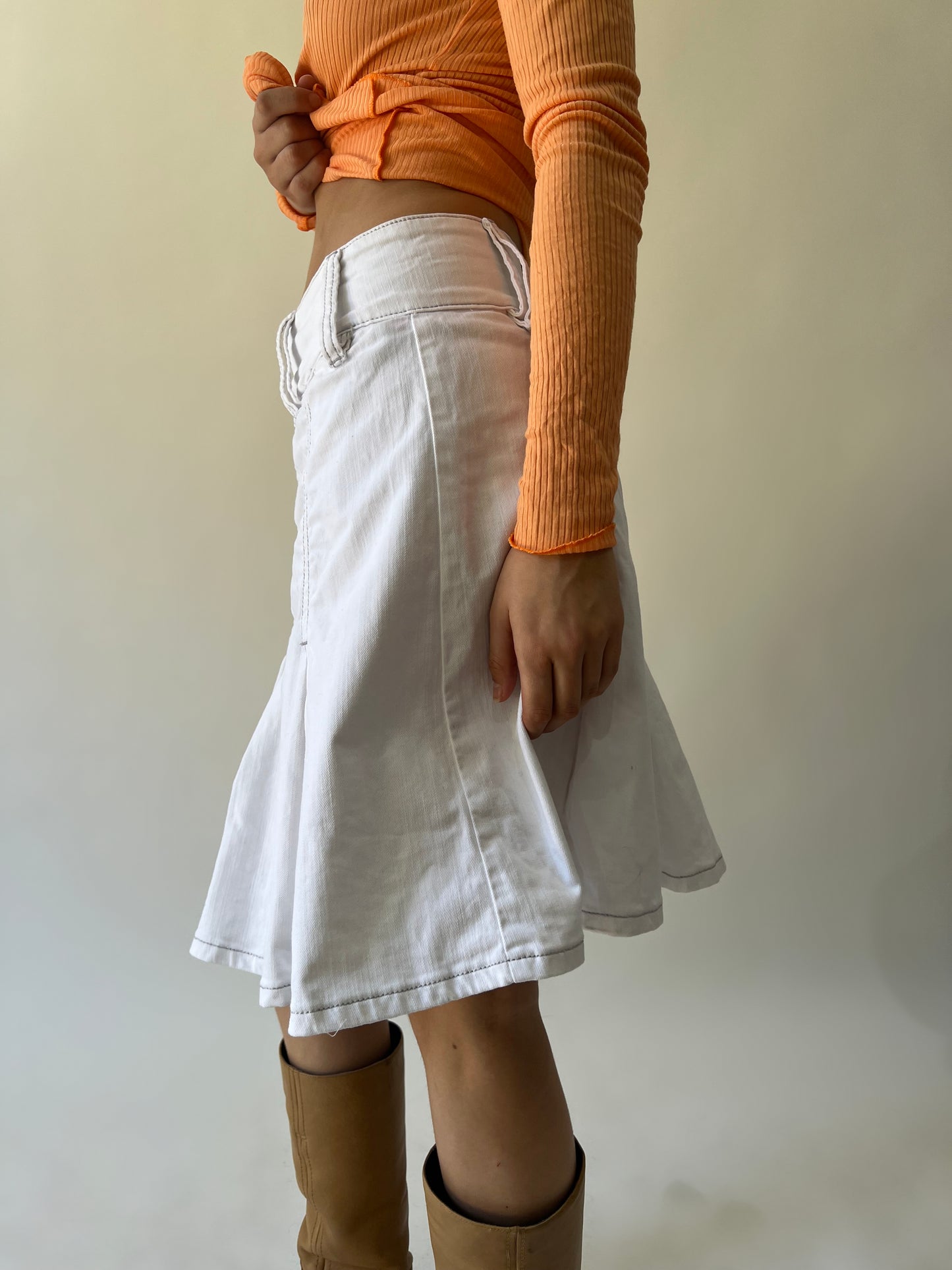 large white flared knee-length skirt side view