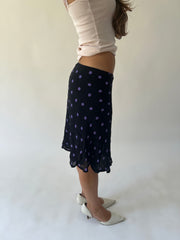 medium black and purple polka dot sheer midi skirt side view