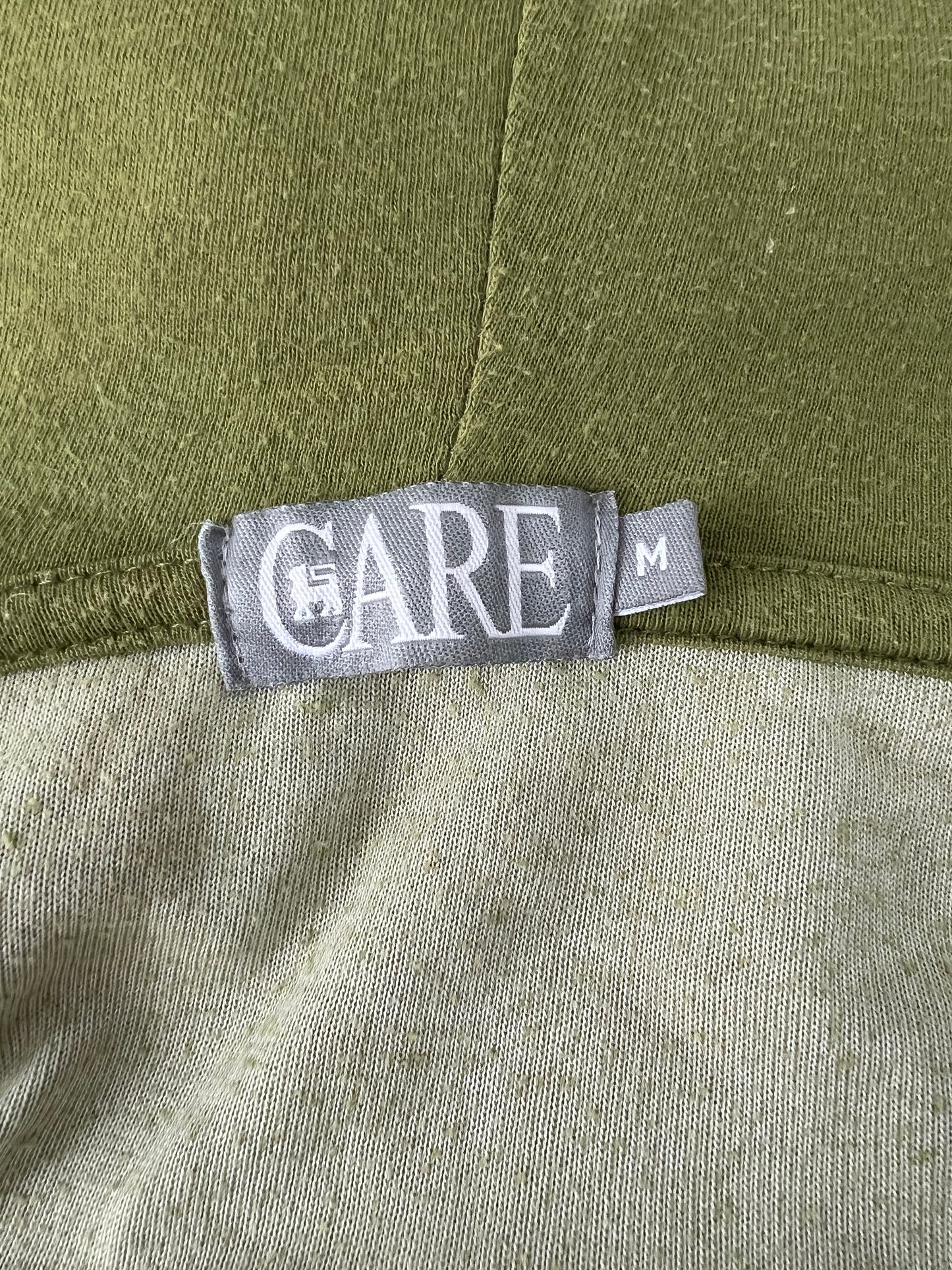medium olive green velour zip hoodie brand and size label