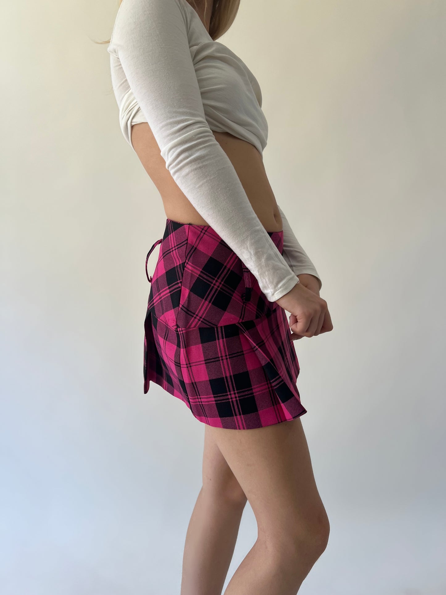 medium pink and black plaid mini skirt angled view