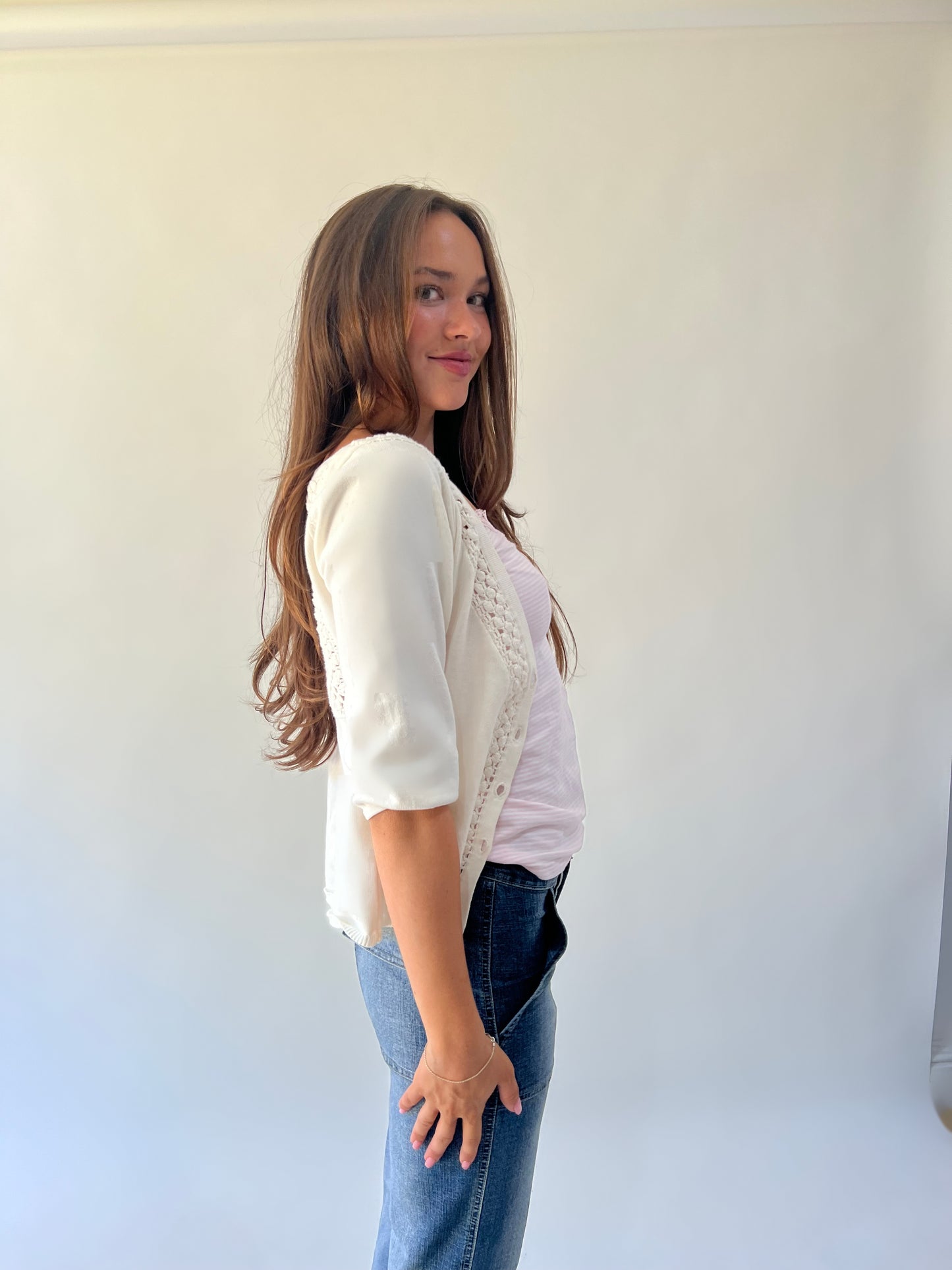 medium white crochet knit cardigan detail