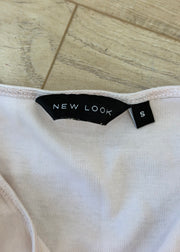 small white new look cami label