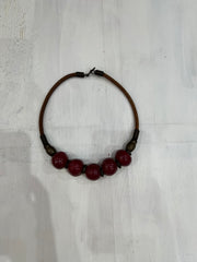one size red beaded necklace flatlay