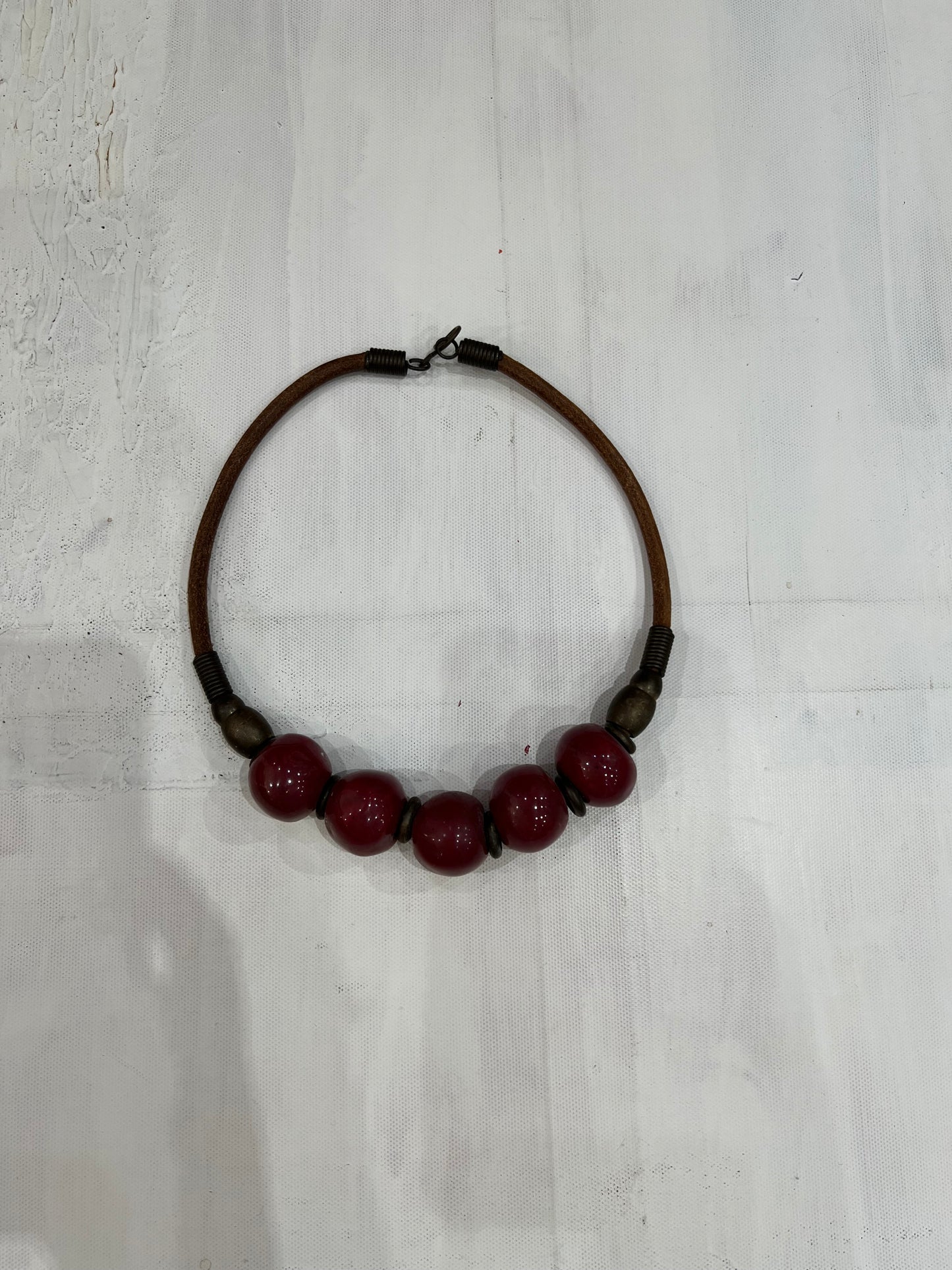one size red beaded necklace flatlay