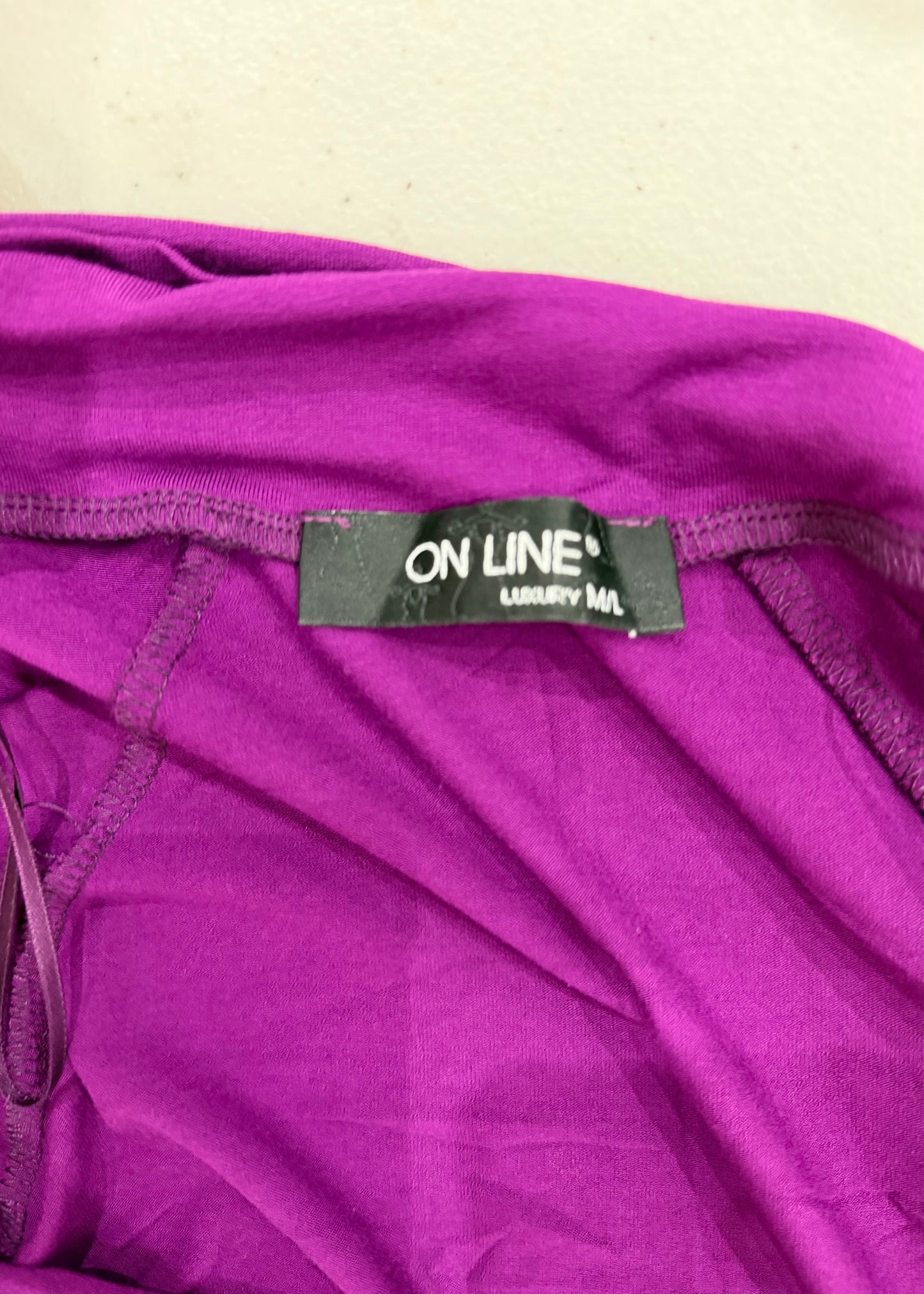 small purple cropped bolero cardigan label