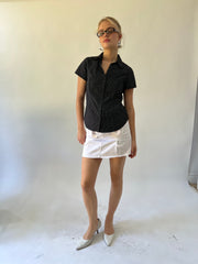 small black and white polka dot short sleeve shirt front view