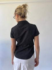 small black and white polka dot short sleeve shirt back view