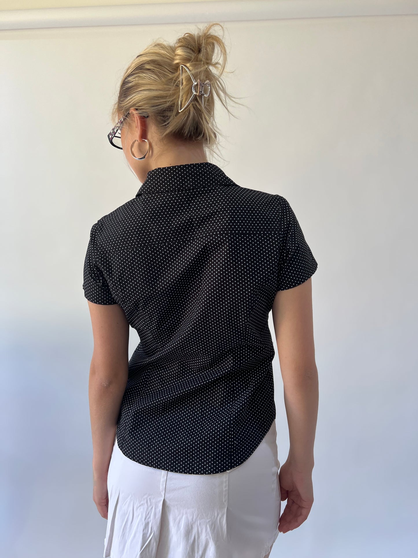 small black and white polka dot short sleeve shirt back view