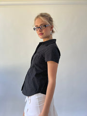 small black and white polka dot short sleeve shirt side view