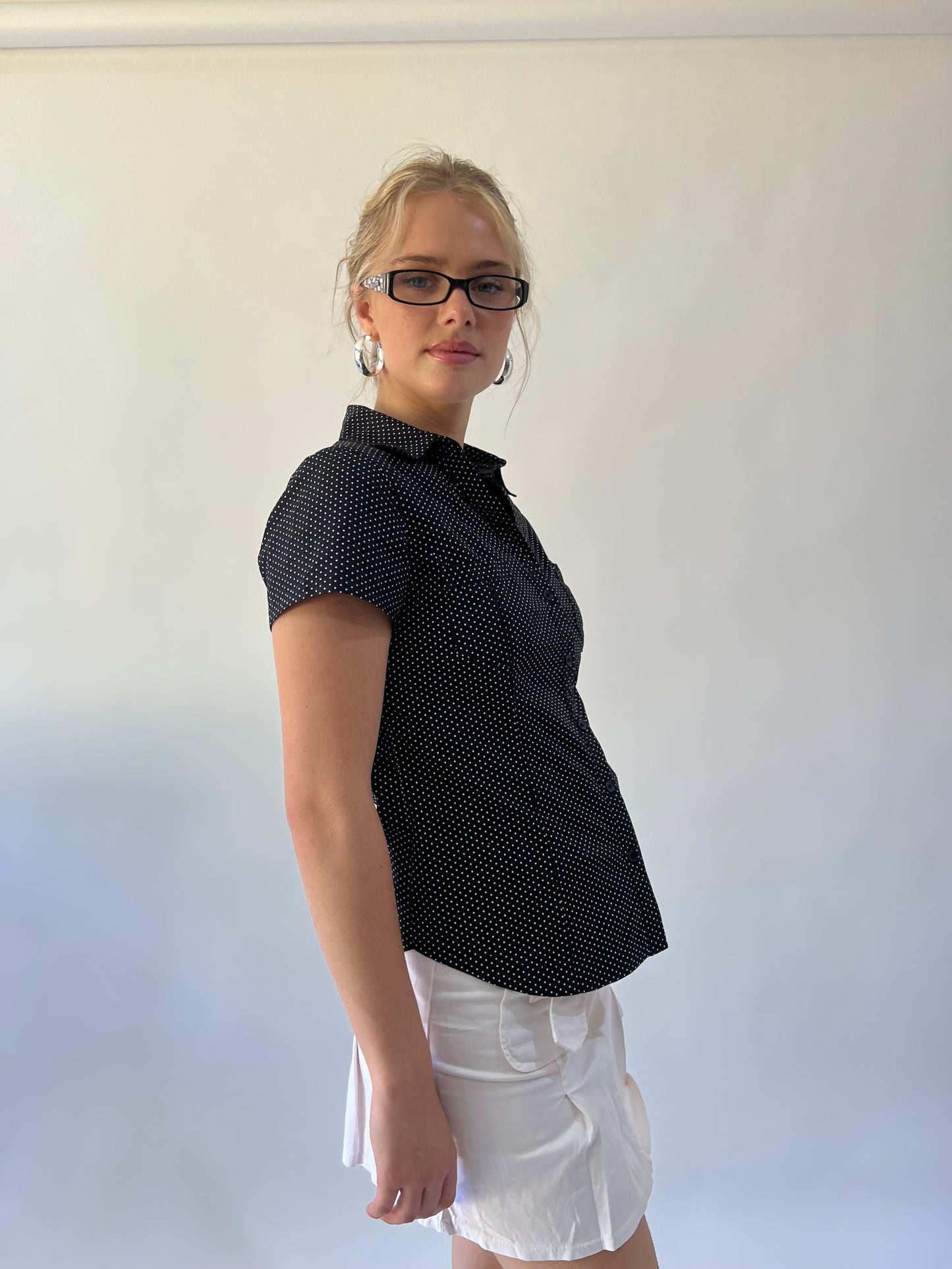 small black and white polka dot short sleeve shirt second side view