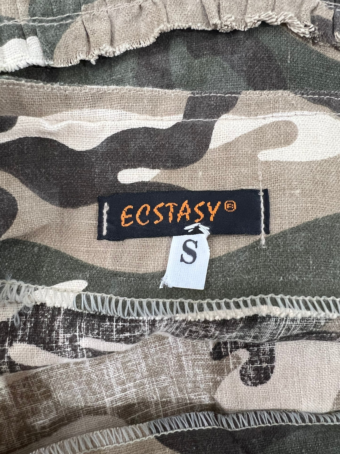 small green and brown camouflage tiered midi skirt brand and size label