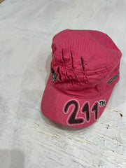 small pink 211 embroidered cap flatlay