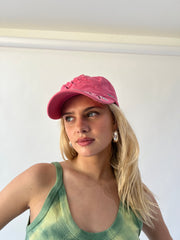 small pink 211 embroidered cap close worn view