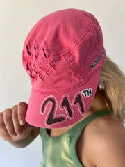 small pink 211 embroidered cap brim detail
