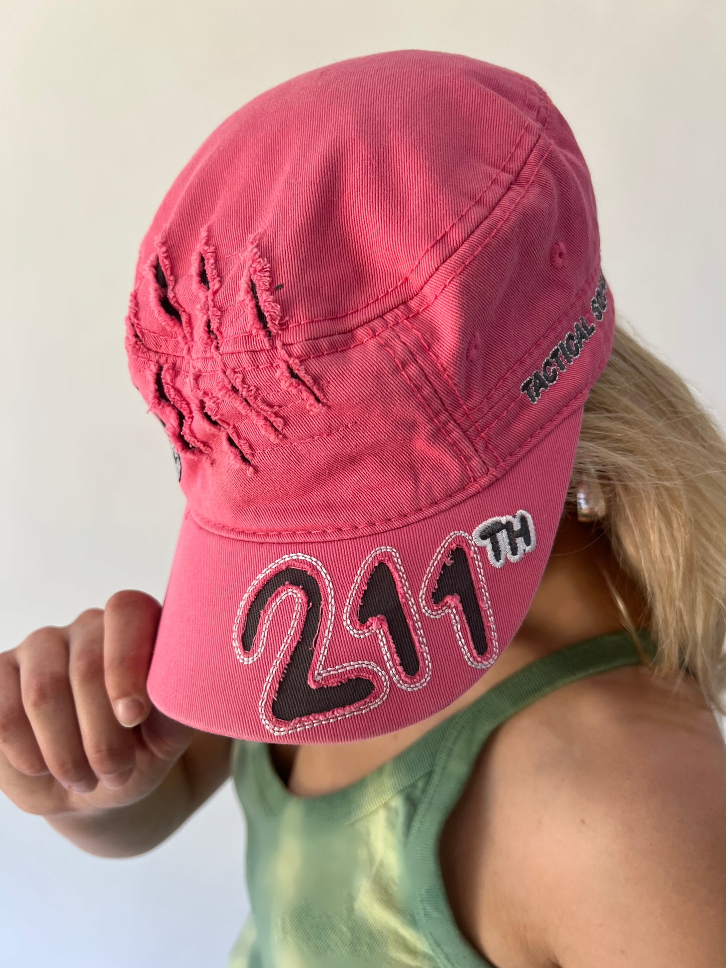 small pink 211 embroidered cap brim detail