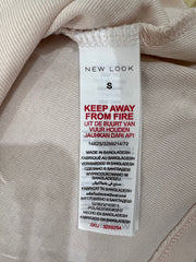 new look cami care label