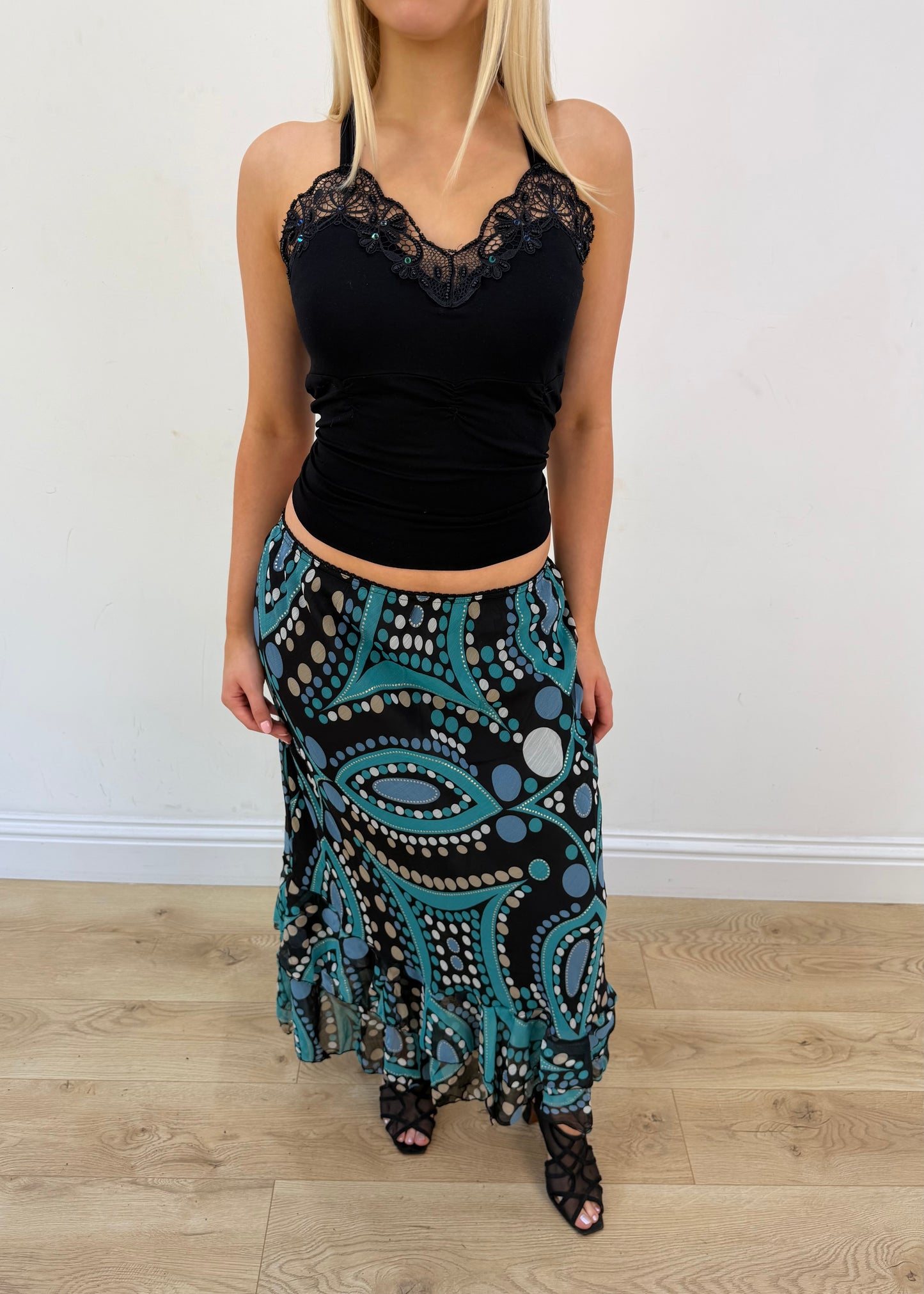 Small turquoise and black midi skirt