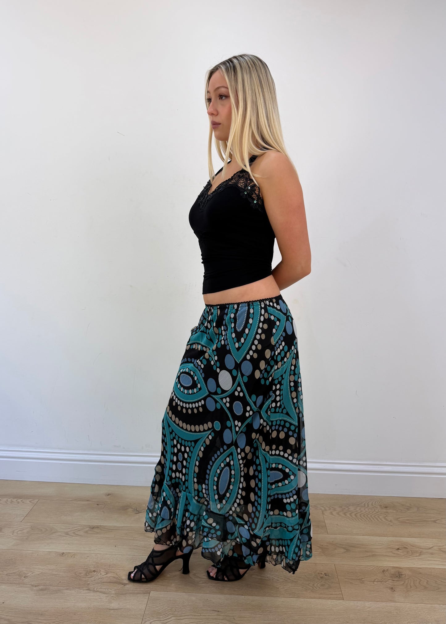 Small turquoise and black midi skirt