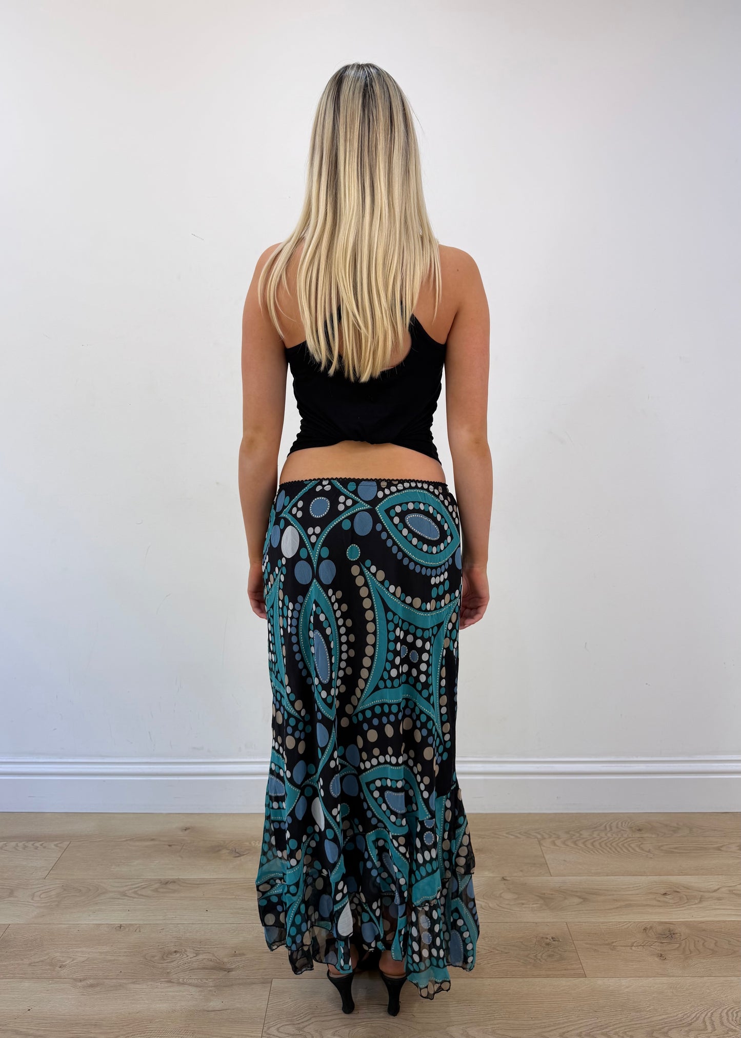 Small turquoise and black midi skirt