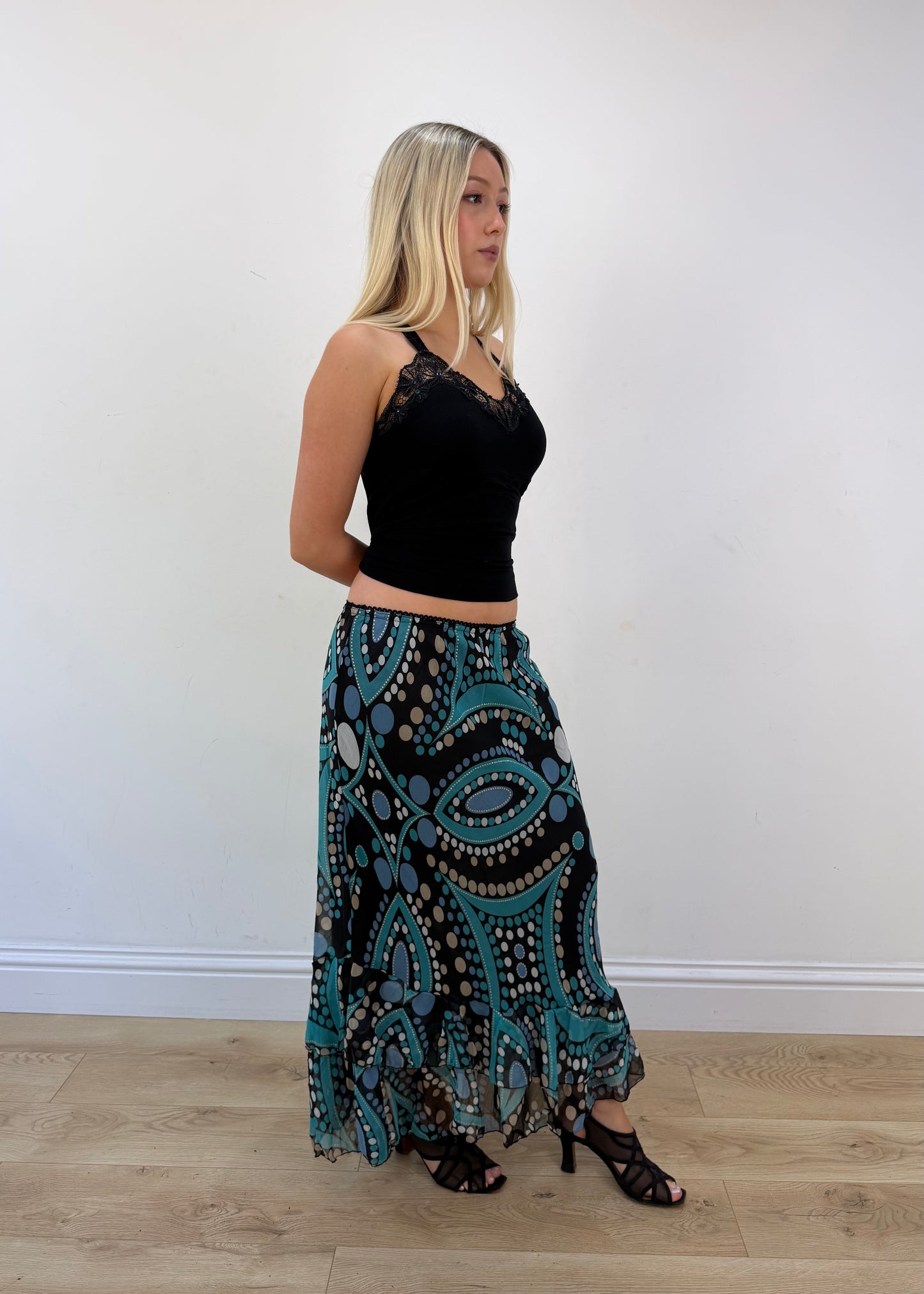 Small turquoise and black midi skirt