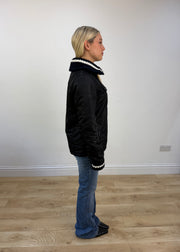 small black puffer jacket with knit ribbed collar 6