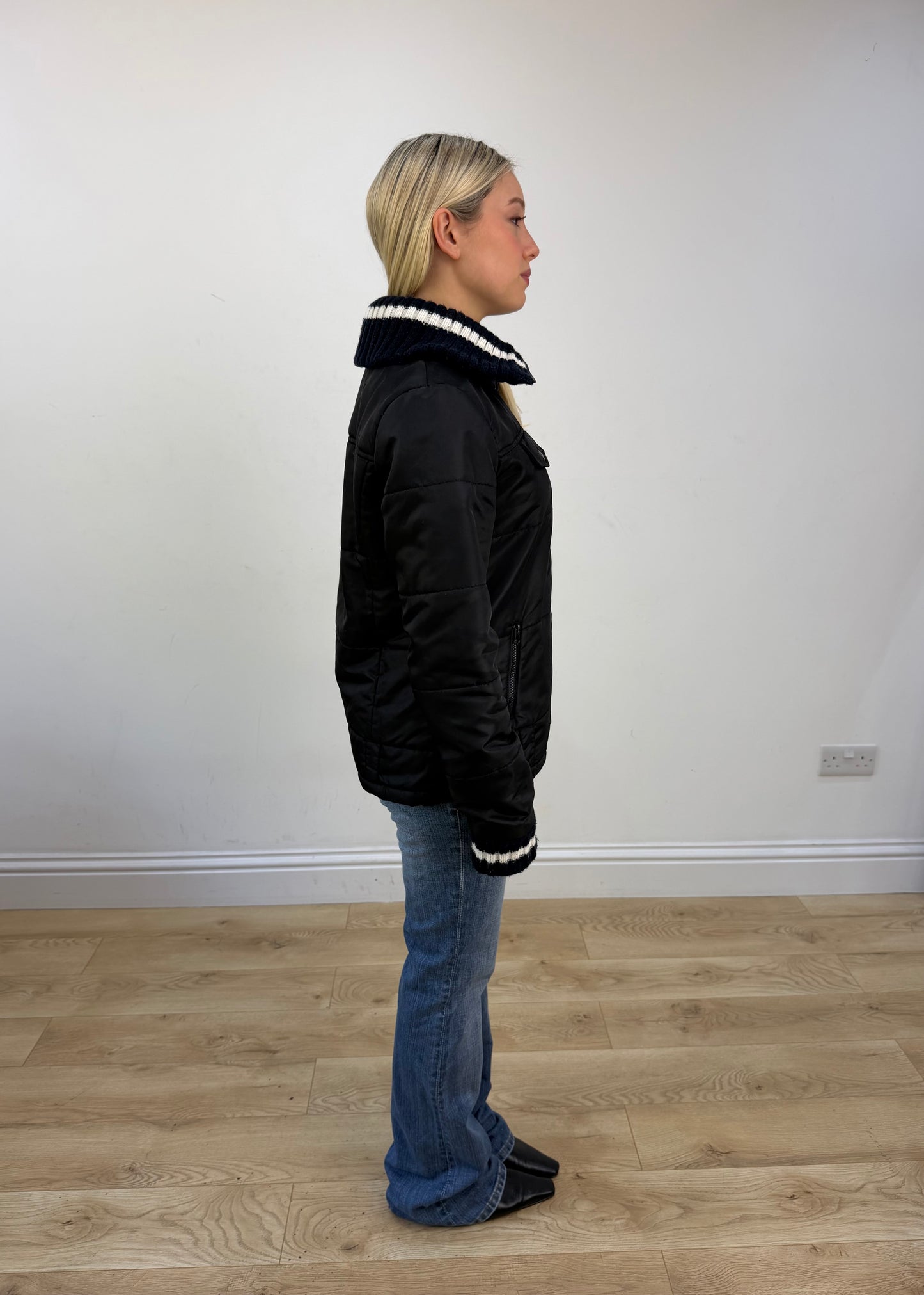 small black puffer jacket with knit ribbed collar 6