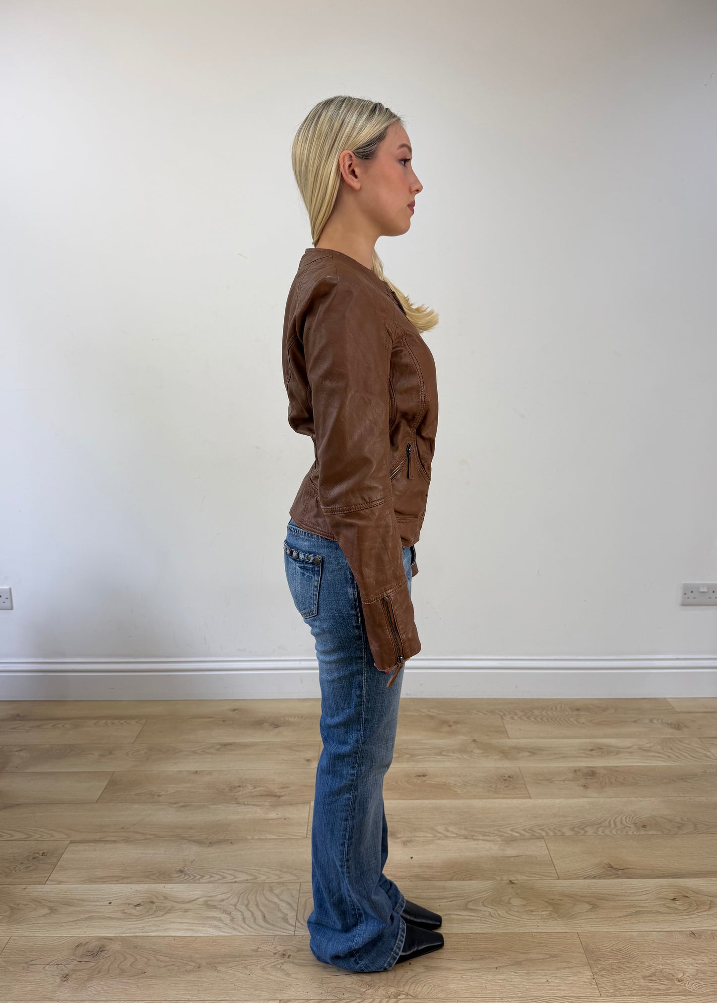 small brown zip up leather jacket 6