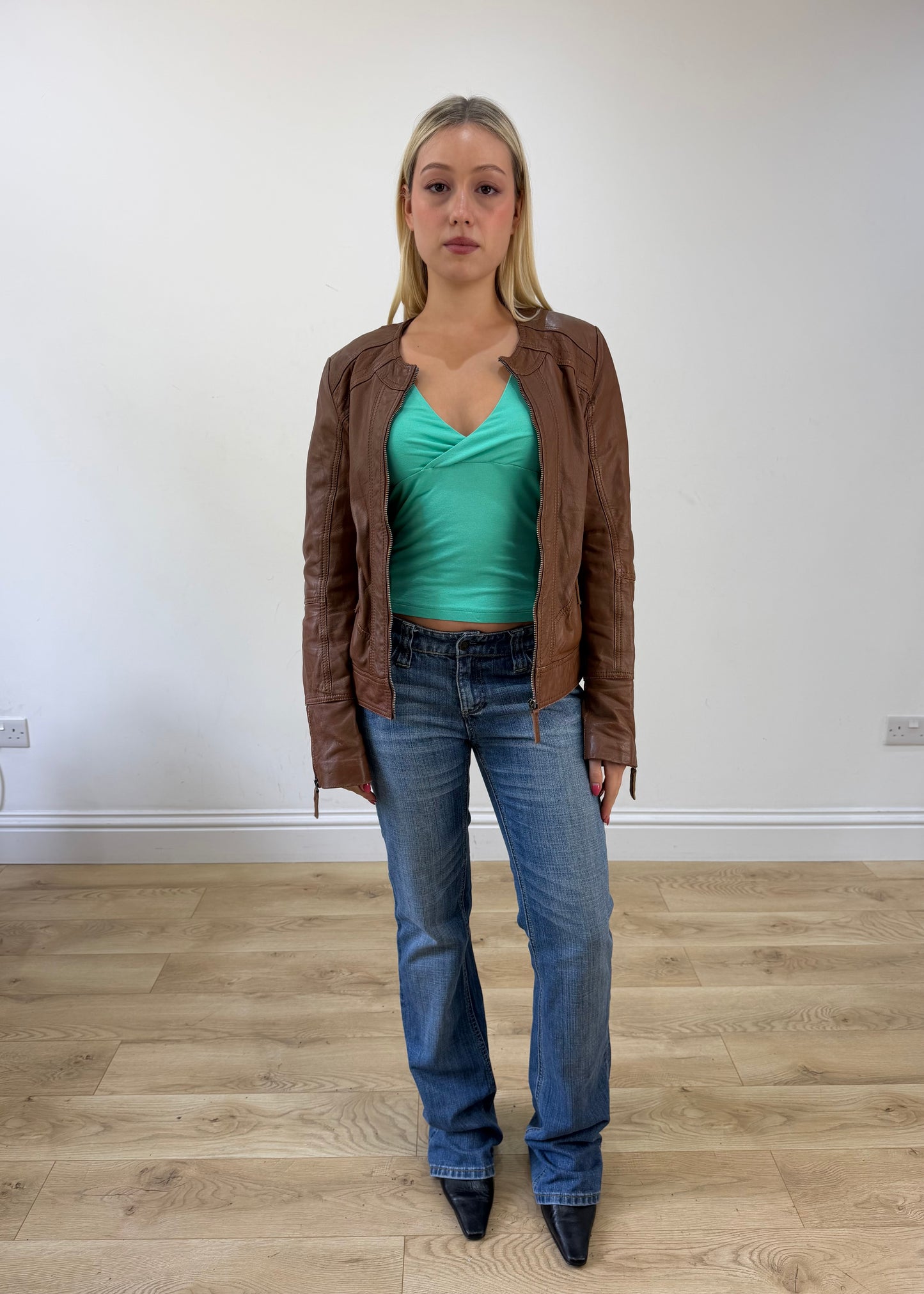 small brown zip up leather jacket 7