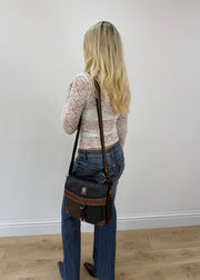 charm and shape black and brown colour block leather bag 5