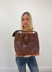 brown leather drawstring shoulder bag with gold buckles 2