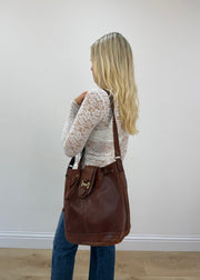 brown leather drawstring shoulder bag with gold buckles 5