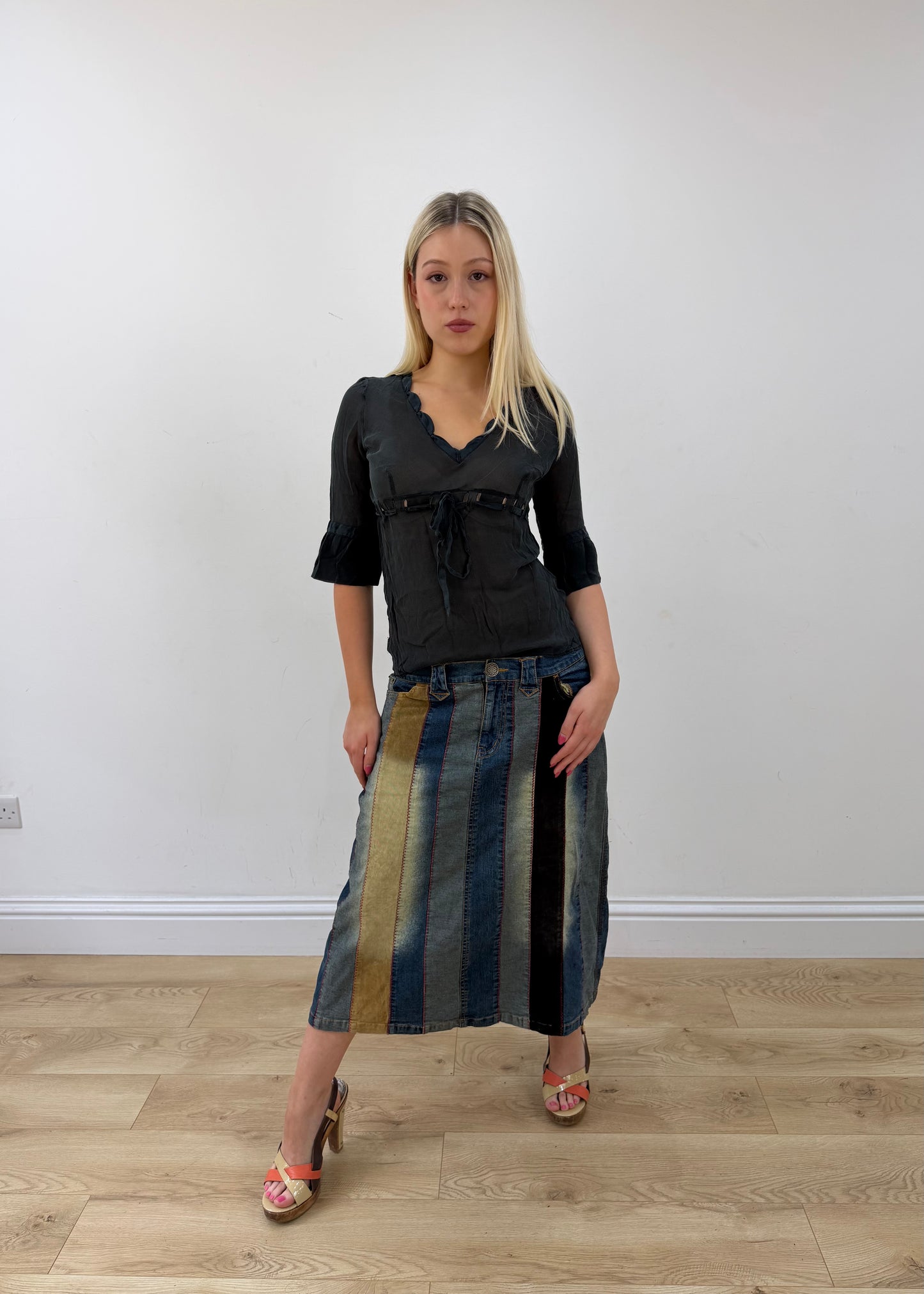 small black intimissimi sheer top posed