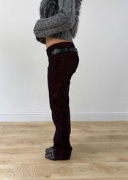 small red and black denim jeans side