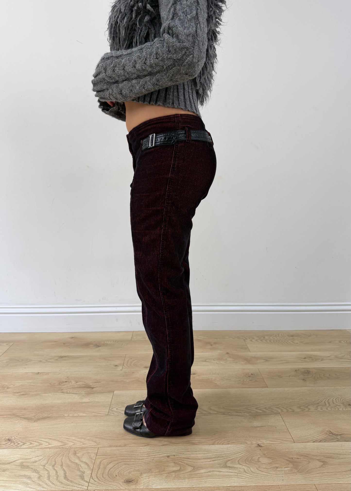 small red and black denim jeans side