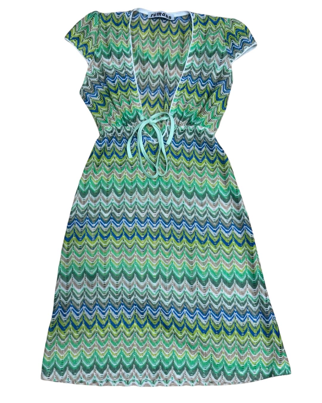 Allegra Dress in Pistachio Green laid flat – front view