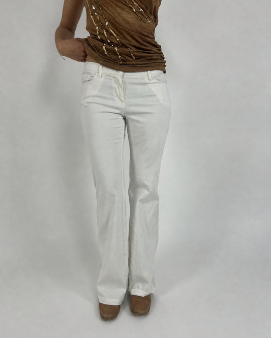 white low-rise flared trousers front view