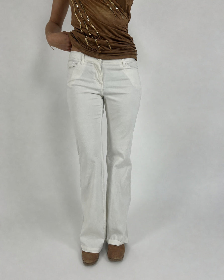 white low-rise flared trousers front view