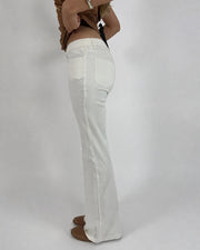 white low-rise flared trousers detail view 01