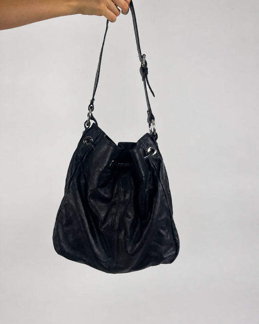 black hobo handbag with hanging details back view