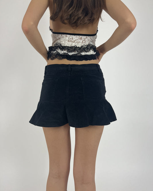 black ruffle-hem shorts back view